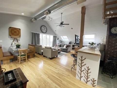 High ceilings and picture window with view are dramatic in the living area.