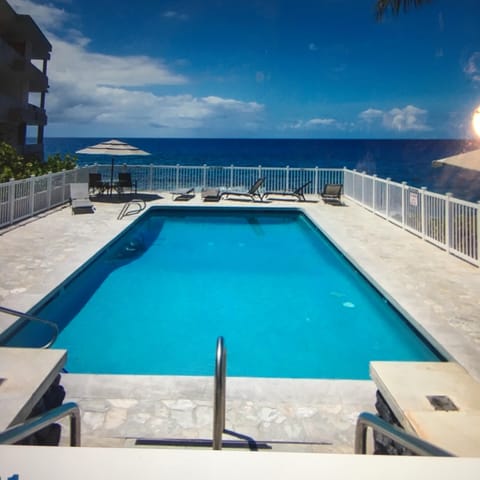 Our pool sits at ocean’s edge- view dolphins or sunset.