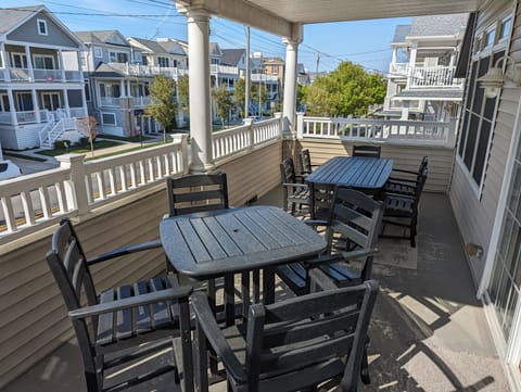Oversized and covered deck with ample seating for 10 to enjoy the fresh air.