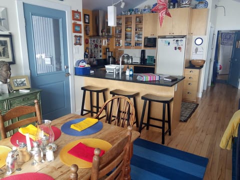 The dining room and kitchen