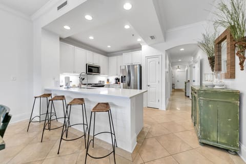 New Kitchen Remodel provides bar seating for 4 in bright updated space'