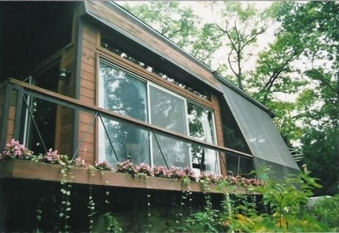 Top to bottom screens enclose eating deck for Spring thru Fall dining