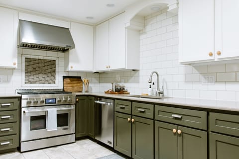 The kitchen has stainless steel Jenn Air chef-grade appliances.