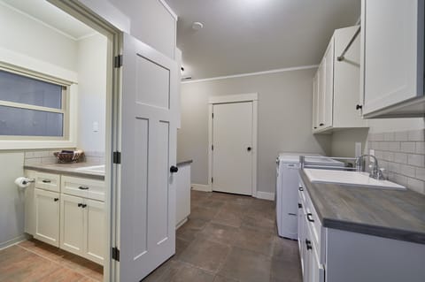 The third bathroom with shower is off the mudroom. 