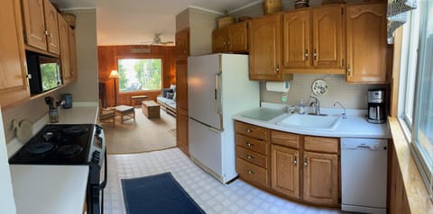 Walking into the kitchen.