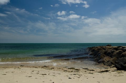 closets beach to the property, 1-2 min walk, .1 miles away