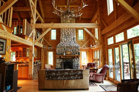 The mantlepiece is a hand-carved, vertical totem pole made by a local artist.