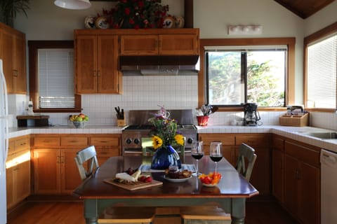Cook a meal while enjoying the Pacific Ocean views from the wrap-around windows!