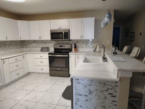 Remodeled kitchen with lots of storage and counter space
