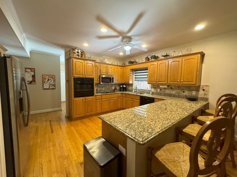 Huge fully equipped kitchen with loads of counter space & extra large fridge.