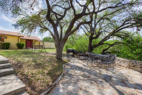 Backyard Gathering Area with Charcoal BBQ grill.