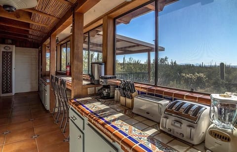 View from kitchen into dining room and deck area.