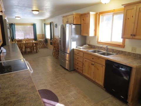 Easily prepare meals on plenty of counter space in the fully equipped kitchen.