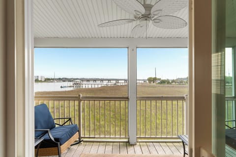 Screened in Porch with Rockers, Couch and Table