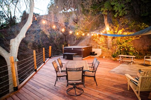 Our enormous rear deck is quite comfortable year round.