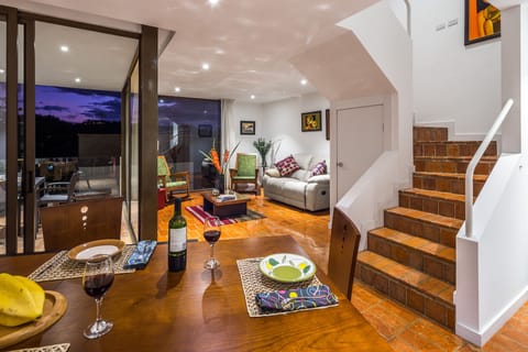 Living room, spiral stairs and dining room