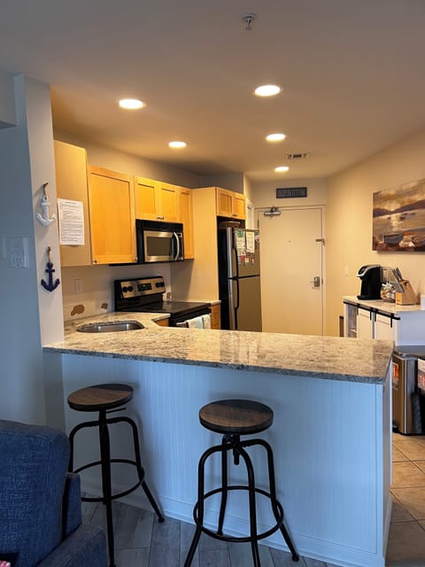 Kitchen - granite countertops and stainless steel appliances