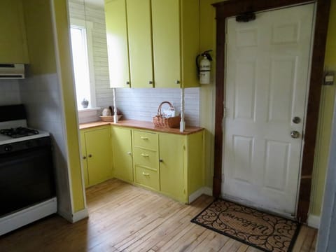 Part of kitchen and door to attached garage.