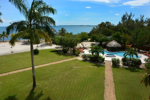 Pool, palapa, gardens and the glittering Caribbean Sea
