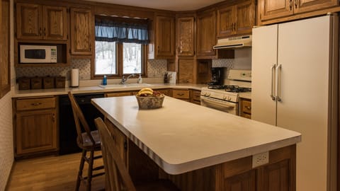 Custom built cabinets to provide cooking for 2 or 10