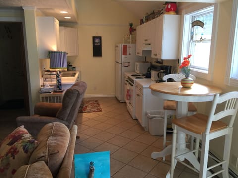 View of the breakfast nook and kitchen as seen from The Birdhouse entrance