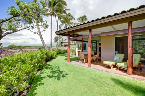 Expansive lanai and grass area.