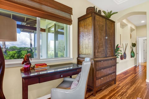 Desk with a view of the Kohala Mountains in the Master.  40" TV in the cupboard.