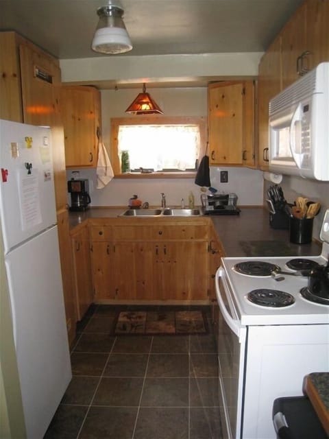 Full size range, microwave, refrigerator. dishwasher.