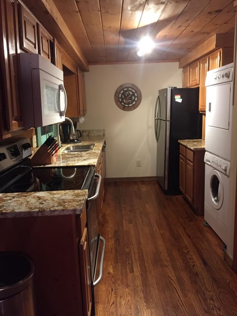 Kitchen with new granite and appliances.