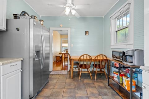Bead board walls and ceilings throughout original to the home.  Kitchen table.