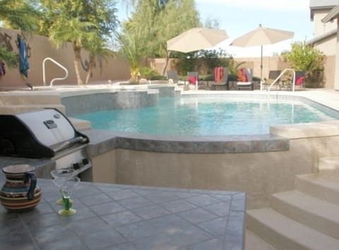 view of pool from swim up bar