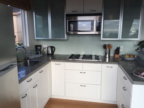 Ikea kitchen, fully equipped for a cook.