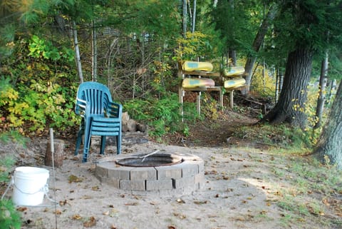 Fire-pit for "dogs and 
sa-mores" - Kayaks ready on there "racks"