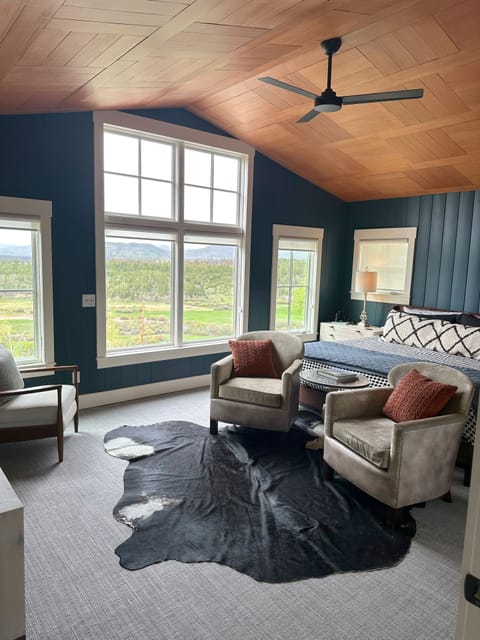 Master bedroom with King bed and sitting area. 