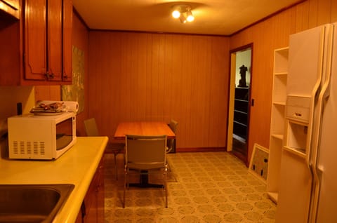 There are 3 seats in kitchen and four seats in living room.