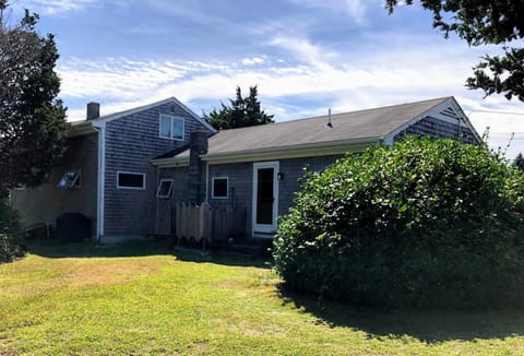 View of the back door and outdoor shower
