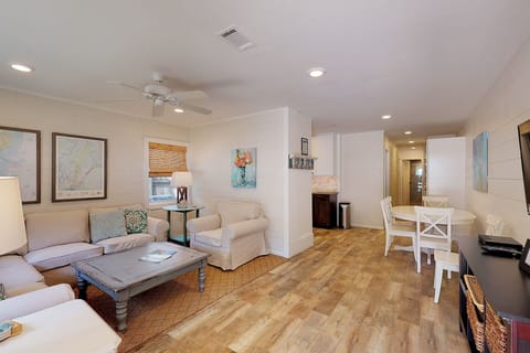 Living Room is comfy with coastal style furnishings.