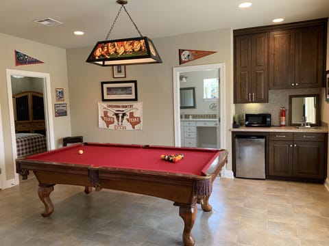 Upstairs gameroom w/ galley-kitchen. View of venue.