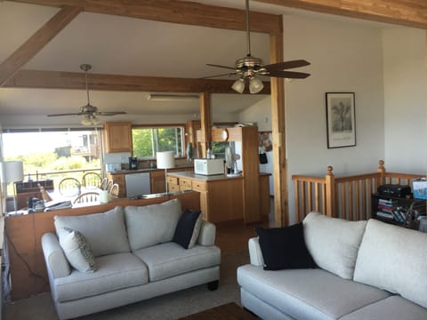 Living room looking into the dining room and kitchen