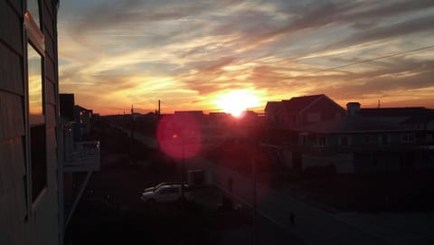 Winter sunset from street side balcony.