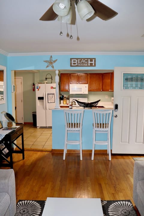 Entry way over looking main living room and kitchen. 