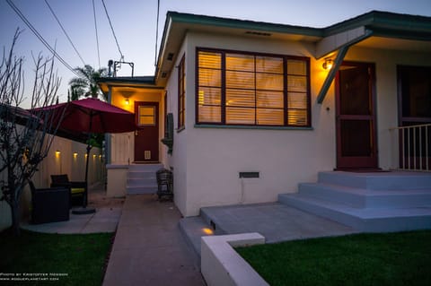 Outdoor patio (at left) at dusk.