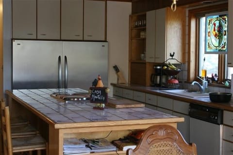 Everyone's favorite room fully equipped with a large Island and great cookbooks