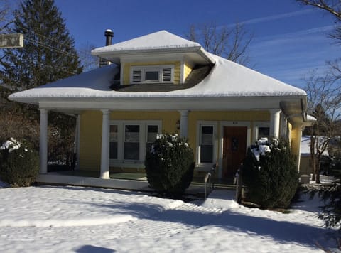 Fresh snow on Montreat Road.
Spacious den. Great for games or watching TV.