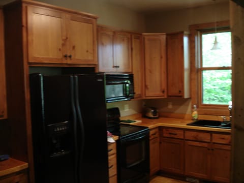 The kitchen with all the nice appliances and our hand crafted counter tops,