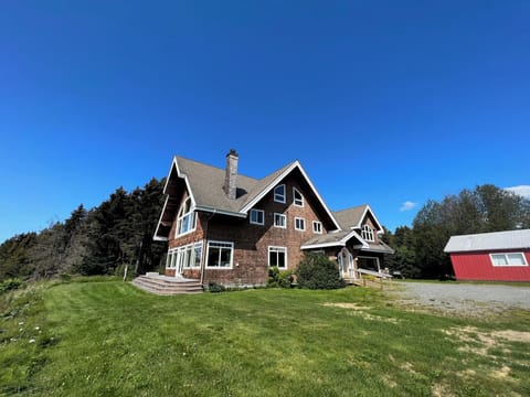 Full view of house and shop