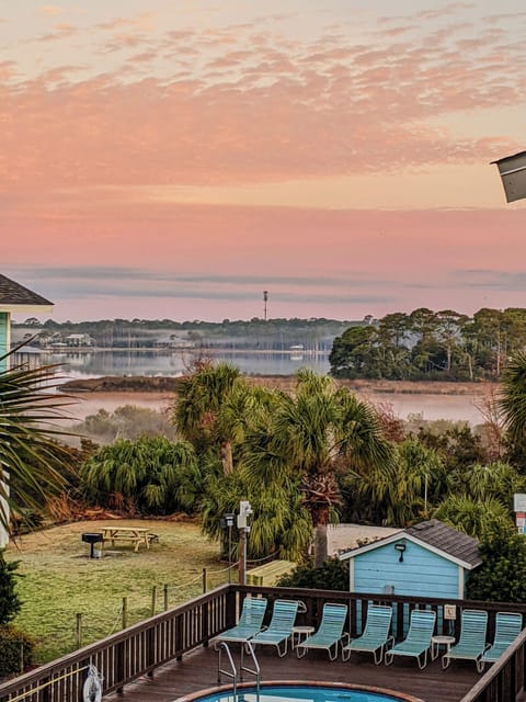 Lagoon view at sunset from the master private balcony! Backyard BBQ/picnic area