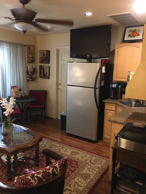 Living Room, Flat Screen TV, looking at Kitchen, Dining area