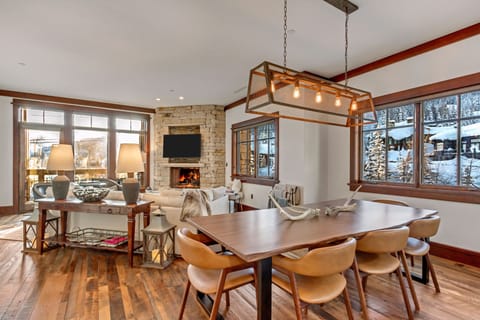 Living and dining room with expansive views, open space and seating for 10+