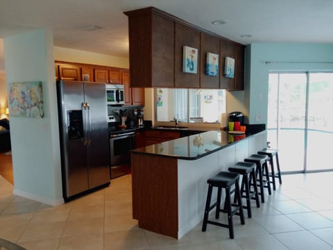 Separate open-concept Kitchen area with Breakfast  Nook and Family room